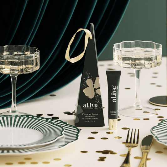 al.ive body | Christmas Lip Butter Bauble - Fig & Toasted Chestnut